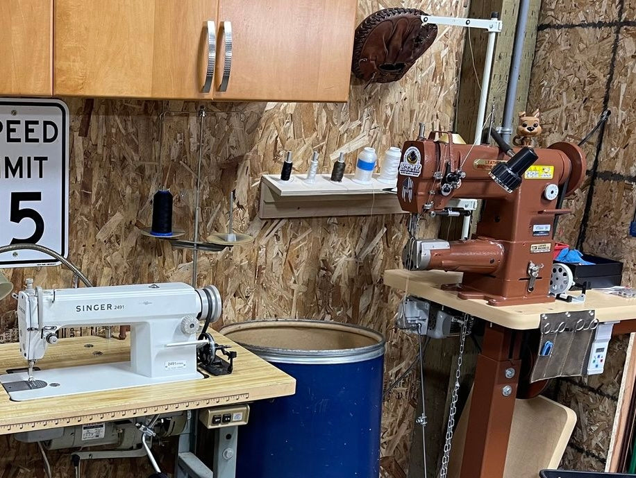 Leatherworking and sewing machines in KTMK Glove Relace workshop – Singer 2491 industrial sewing machine and a Cobra class 26 leather stitcher for baseball and softball glove repairs.